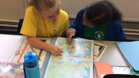 Children looking at a map